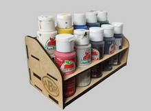 Load image into Gallery viewer, Set of paint bottles in a wooden holder on a wooden surface